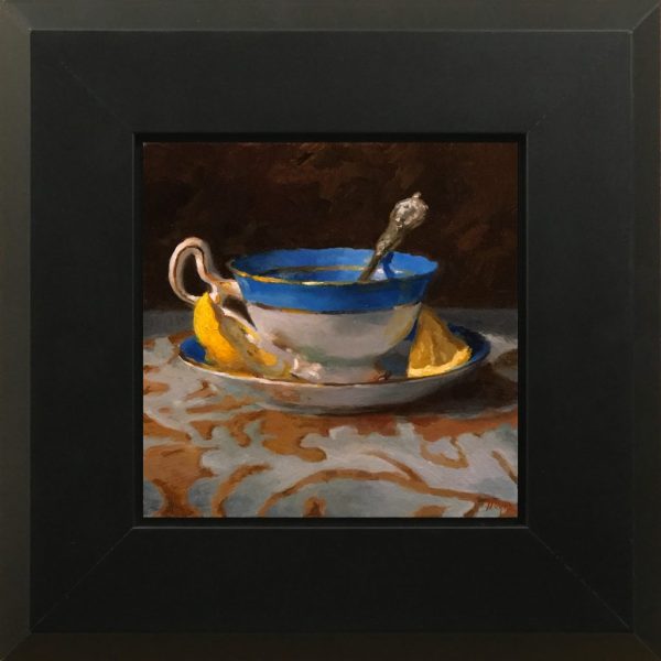 Blue Teacup with Lemon Wedges