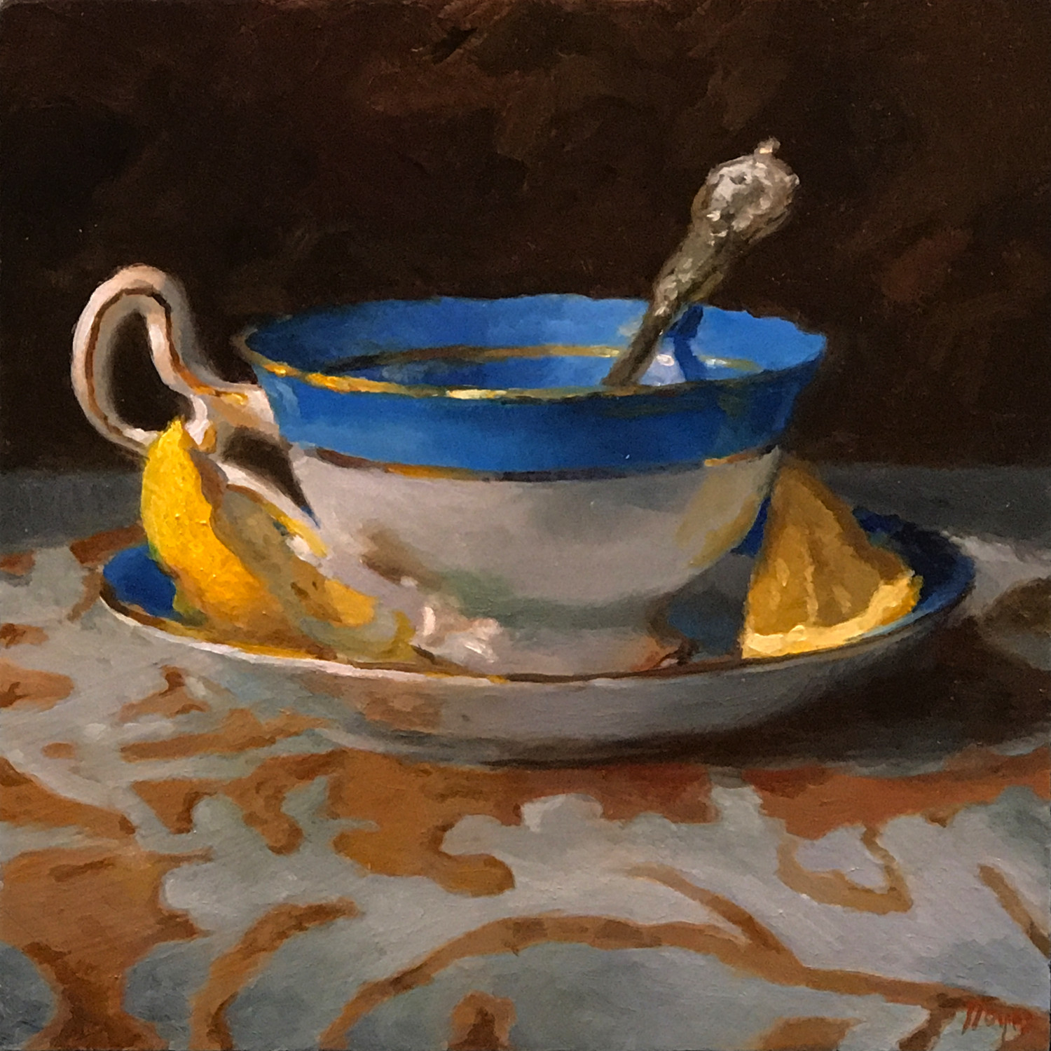 Blue Teacup with Lemon Wedges